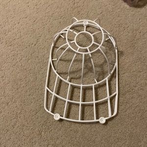 Plastic cage to wash caps